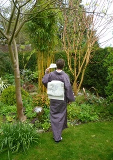 A cocoon of meaning. Person-Time-Place-Occasion Symbolism in Kimono  logo