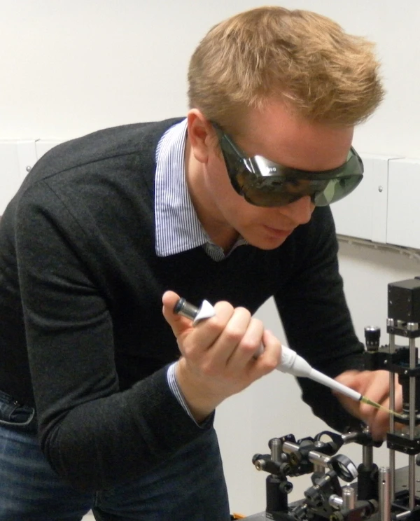 Isolation and Trapping using Optical Tweezers logo