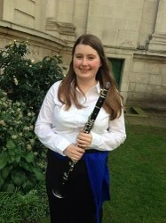 Unattended music, cognition, and the experimental paradigm: the 'background-ness' of background music logo